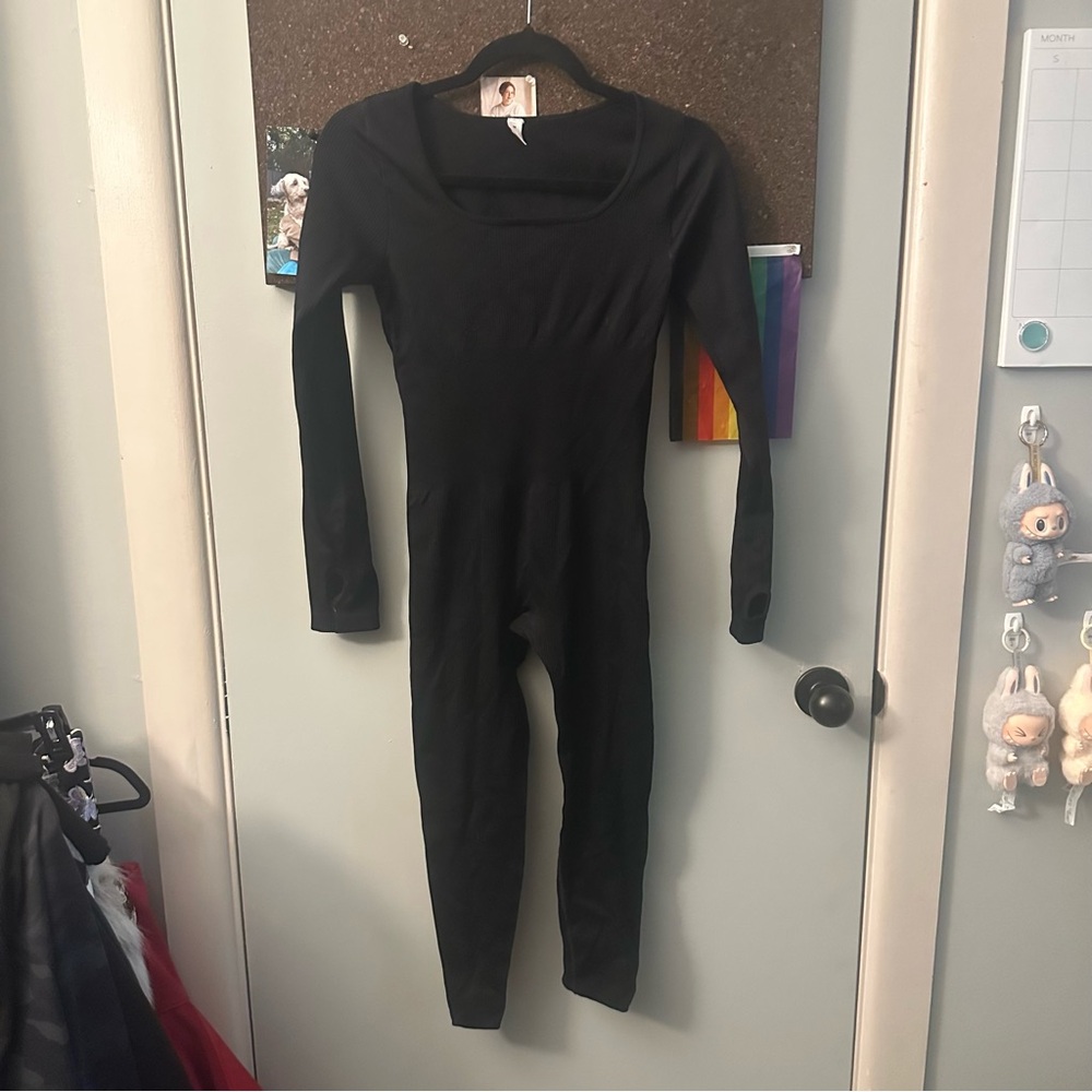 Women’s black snatched waist body suit